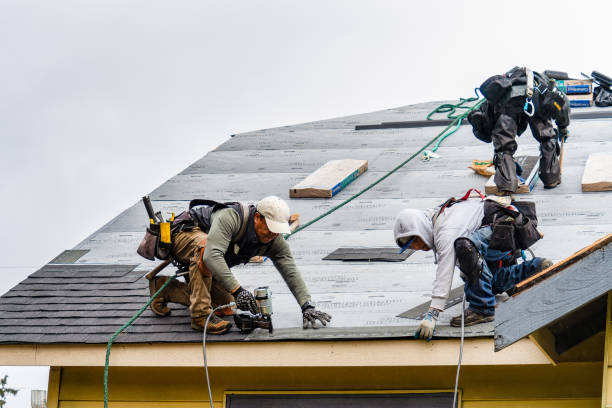 Professional Storm Damage Roof Repair technician working in Rome, NY